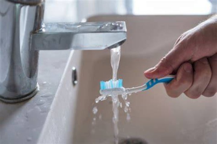 Does brushing your teeth in the shower conserve water?