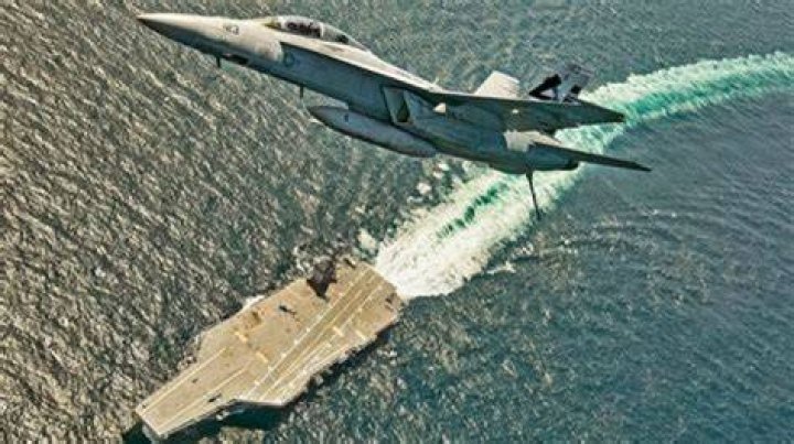How many planes can an aircraft carrier launch at once?
