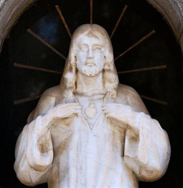 Who was on the left side of Jesus on the cross?