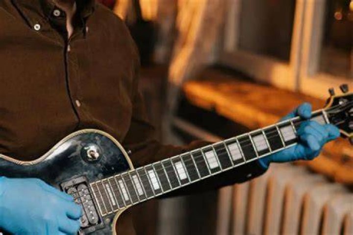 Why do bassists wear gloves?
